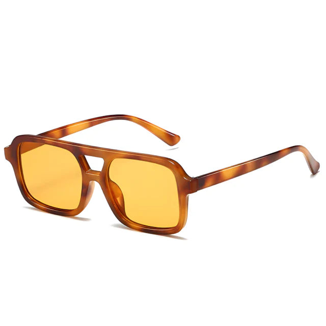 Os óculos de sol Eyvon combinam proteção UV, estilo marcante e conforto absoluto para te acompanhar sob qualquer sol